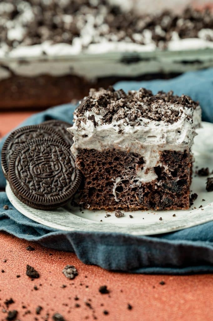piece of cake and Oreos on a plate