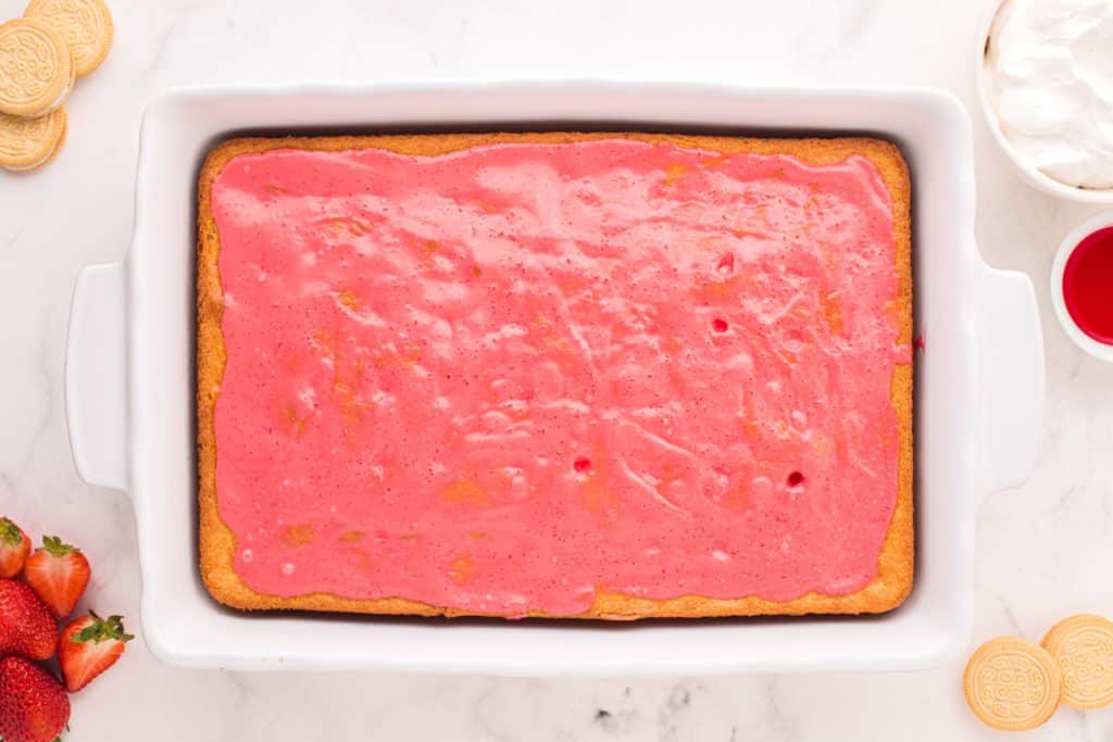 a poke cake with Jello spread over the top