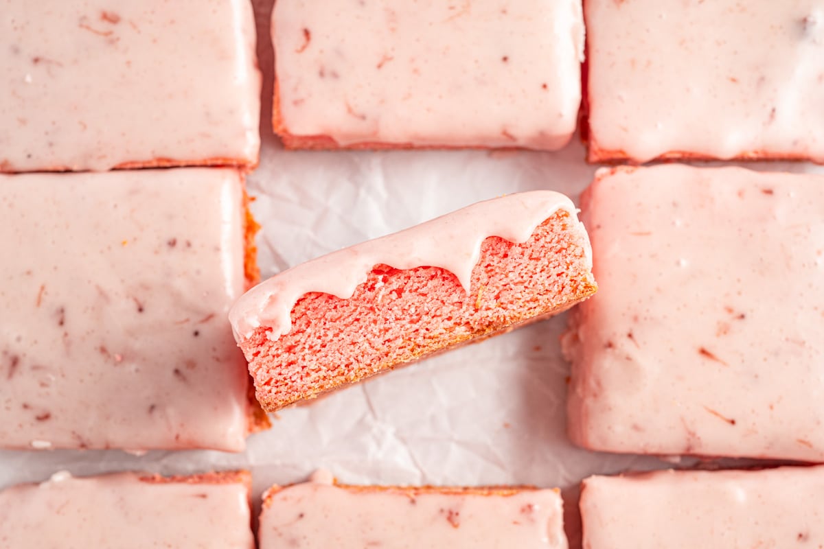 strawberry brownies cut in squares on a table