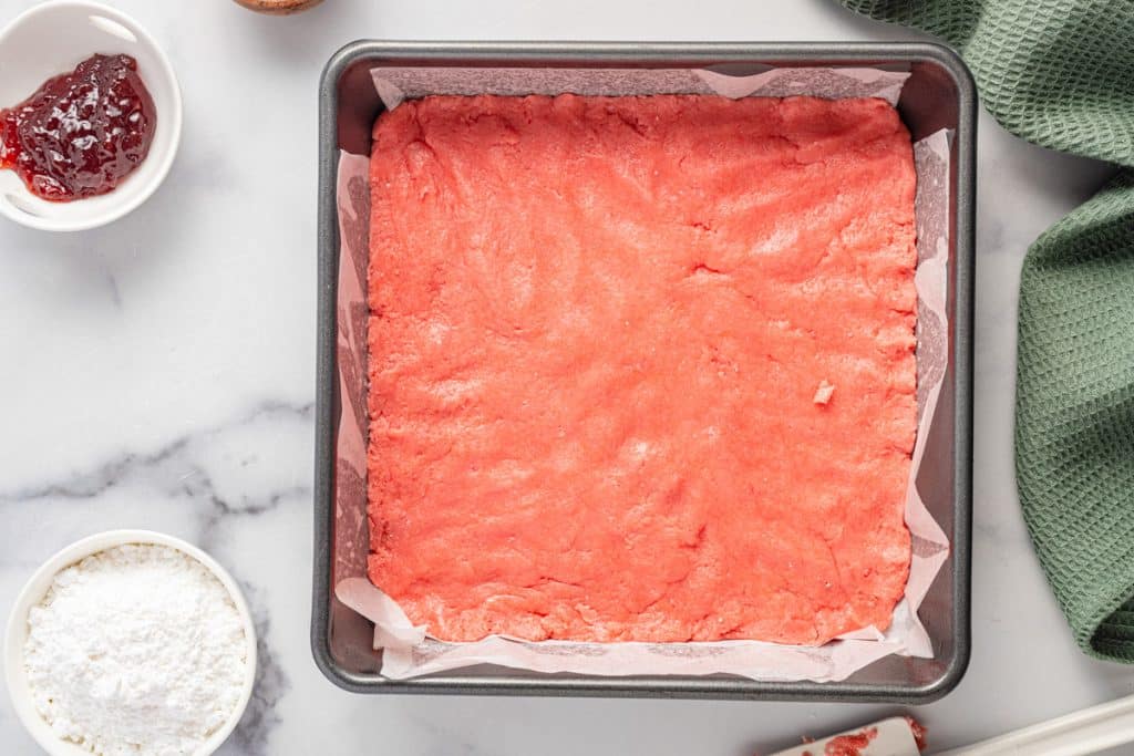 unbaked strawberry brownies in a pan