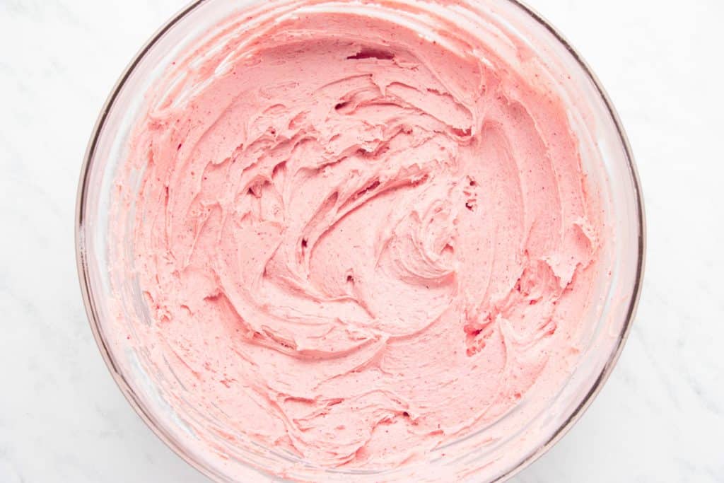 strawberry buttercream in a mixing bowl