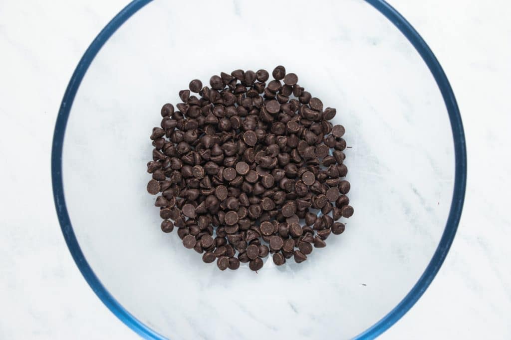 chocolate chips in a glass mixing bowl